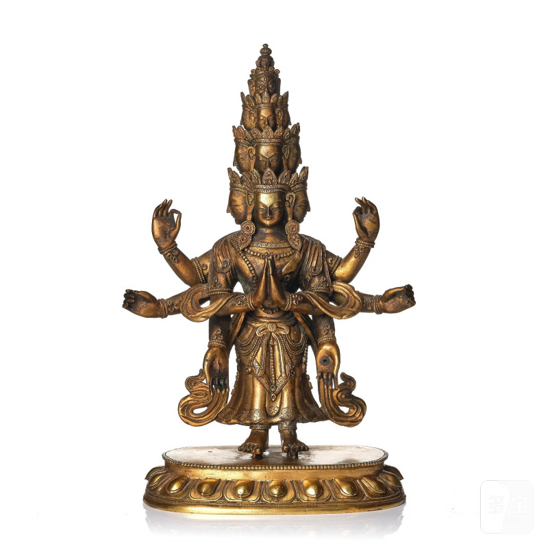 A Tibeto-Chinese gilt bronze figure of Avalokiteshvara Ekasdashamukra,
